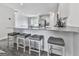 Modern kitchen featuring a granite countertop island with seating and open layout design at 520 Pemberton St, Euharlee, GA 30145