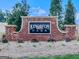 Kingston Park neighborhood entrance sign surrounded by landscaped greenery and vibrant foliage at 520 Pemberton St, Euharlee, GA 30145