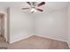 Bedroom with carpet and ceiling fan at 7335 Connell Rd, Fairburn, GA 30213