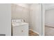 Laundry room with a white washing machine at 7335 Connell Rd, Fairburn, GA 30213