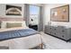 Well decorated bedroom featuring natural light, stylish furniture, and appealing decorative elements at 11569 Kimberly Way, Hampton, GA 30228