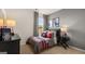 Racecar themed bedroom with racing decorations and furniture in neutral tones at 143 Oakchase Park Ln, Hampton, GA 30228