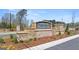 Stone and brick sign marking the entrance to the Oakchase at Hampton community at 143 Oakchase Park Ln, Hampton, GA 30228
