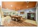 Finished basement with a pool table and access to the backyard at 250 Friendship Church Rd, Brooks, GA 30205