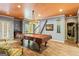 Large finished basement with a pool table and outside access at 250 Friendship Church Rd, Brooks, GA 30205
