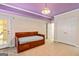 Finished basement featuring daybed, closet and door to the outside at 250 Friendship Church Rd, Brooks, GA 30205