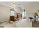 View of the bedroom with neutral paint, carpet, and a ceiling fan at 250 Friendship Church Rd, Brooks, GA 30205