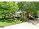 Charming home with mature trees, lush landscaping, and beautiful curb appeal at 250 Friendship Church Rd, Brooks, GA 30205