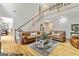 Spacious living room with high ceilings, a staircase, and hardwood floors at 250 Friendship Church Rd, Brooks, GA 30205