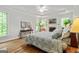 Spacious main bedroom featuring a trey ceiling, natural light, and a fireplace at 250 Friendship Church Rd, Brooks, GA 30205