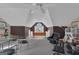 Large, open bonus room with vaulted ceiling, desk space, and seating area at 168 Maple Grove Ter, Peachtree City, GA 30269
