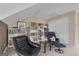 Reading nook in bonus room with shelving and chairs at 168 Maple Grove Ter, Peachtree City, GA 30269