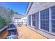 Wooden deck with outdoor furniture and views of the backyard at 168 Maple Grove Ter, Peachtree City, GA 30269