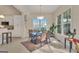 Inviting dining room bathed in natural light features a tiled floor and access to the outside at 168 Maple Grove Ter, Peachtree City, GA 30269