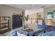 Cozy living room with neutral tones, decorative accents, and natural light from the open staircase at 168 Maple Grove Ter, Peachtree City, GA 30269