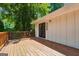 Spacious outdoor deck with wood railings and plenty of room for entertaining at 234 Kenilworth Cir, Stone Mountain, GA 30083