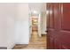 Bright foyer with hardwood floors leading to an open kitchen at 234 Kenilworth Cir, Stone Mountain, GA 30083