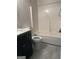 The bathroom features a vanity with marble top and a tub/shower combination at 393 Macland Dr, Lawrenceville, GA 30045