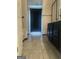 Bathroom featuring tile flooring, dark cabinetry, and walk-in shower at 393 Macland Dr, Lawrenceville, GA 30045