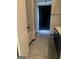 Bathroom featuring tile flooring, dark cabinetry, and a walk-in shower at 393 Macland Dr, Lawrenceville, GA 30045