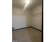 Bedroom featuring carpet flooring, white walls, and a small closet at 393 Macland Dr, Lawrenceville, GA 30045