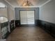 Formal dining room featuring custom molding and wood-look flooring at 393 Macland Dr, Lawrenceville, GA 30045