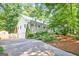 Beautiful home with a two-car garage and gorgeous landscaping at 3515 Chattahoochee Rd, Cumming, GA 30041