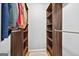 Spacious walk-in closet features custom shelving and hardwood floors at 3515 Chattahoochee Rd, Cumming, GA 30041
