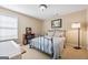 Comfortable bedroom with a ceiling light, a window and neutral walls perfect for relaxation and rest at 6142 Golf View Xing, Locust Grove, GA 30248