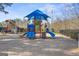 Community playground with colorful play equipment and a fenced perimeter at 6142 Golf View Xing, Locust Grove, GA 30248