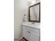Bathroom featuring a vanity, mirror, and a neutral color scheme at 310 Trestle Rd, Locust Grove, GA 30248
