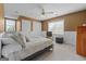 Comfortable bedroom with neutral tones, ample closet space, and a cozy ambiance at 310 Trestle Rd, Locust Grove, GA 30248