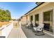 Outdoor deck with cushioned chairs offers a cozy seating area for relaxation at 27 Riverview, Euharlee, GA 30145