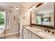 Bathroom featuring double sinks and a large mirror at 27 Riverview, Euharlee, GA 30145