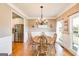 Traditional dining room featuring a round table with hardwood floors at 27 Riverview, Euharlee, GA 30145