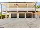 Spacious three-car garage with dark doors and ample parking space at 27 Riverview, Euharlee, GA 30145