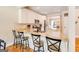 A kitchen featuring a countertop with seating and stainless steel appliances at 27 Riverview, Euharlee, GA 30145