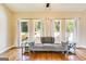 Comfortable living room with hardwood floors and natural lighting from three windows at 27 Riverview, Euharlee, GA 30145