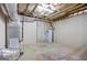 Unfinished basement showcasing the water heater and the home's infrastructure and utilities at 230 Hummingbird Ct, Hampton, GA 30228