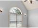 Bedroom featuring a large window, ceiling fan, and neutral paint at 230 Hummingbird Ct, Hampton, GA 30228