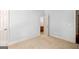 Empty bedroom with neutral carpet and paint, awaiting your personal touch at 230 Hummingbird Ct, Hampton, GA 30228