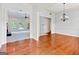 Open floor plan features hardwood floors and natural light at 230 Hummingbird Ct, Hampton, GA 30228