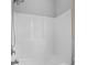 A clean white shower stall equipped with a modern shower head and fixtures at 230 Hummingbird Ct, Hampton, GA 30228