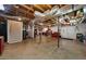 The basement features exposed ceilings, a finished stairway, and an egress to the back yard at 4335 Hurt Bridge Lane, Cumming, GA 30028