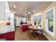 A cozy kitchen featuring marble countertops, stainless appliances, and hardwood flooring at 4335 Hurt Bridge Lane, Cumming, GA 30028