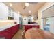A modern kitchen design with stainless steel appliances, marble countertops, and hardwood floors at 4335 Hurt Bridge Lane, Cumming, GA 30028