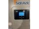 Close-up of a Sol-Ark solar inverter, highlighting system monitoring and power conversion features at 4335 Hurt Bridge Lane, Cumming, GA 30028