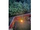 Overhead shot of a backyard with greenery, rock features, and a wooden fence at 241 Balaban Cir # 241, Woodstock, GA 30188