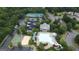 Aerial view of community amenities including pool, tennis court, sand volleyball and playground at 241 Balaban Cir # 241, Woodstock, GA 30188