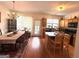 Eat-in kitchen features wood cabinets, granite counters, and stainless steel appliances at 241 Balaban Cir # 241, Woodstock, GA 30188